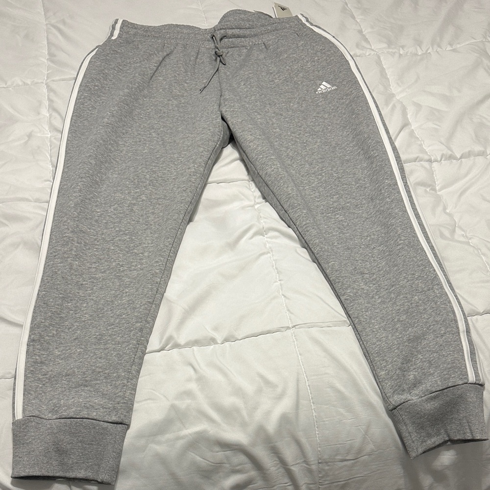 Adidas Women’s  Light Gray Joggers with White Stripes